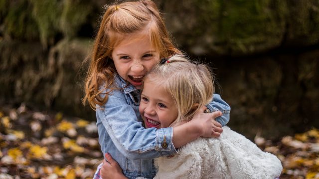 two girls hugging