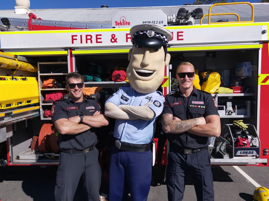 constable care mascot with firefighters