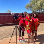 aborginal children using film equipment