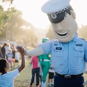 constable care high fiving a child